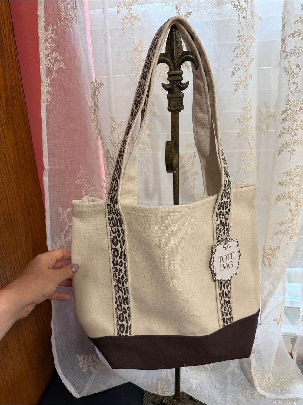 Animal print brown and cream canvas tote bag with inside pockets